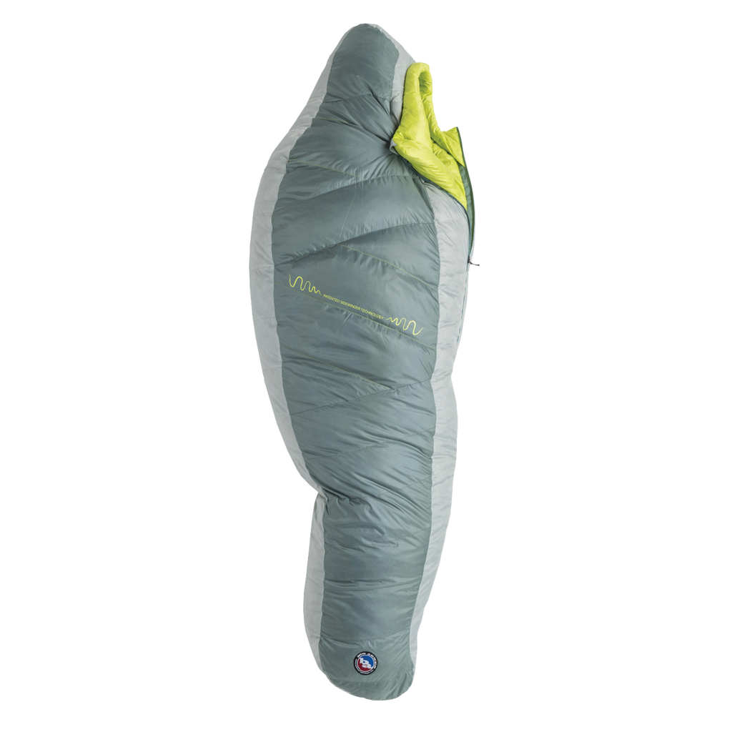The Big Agnes Sidewinder 0˚ is a green and gray mummy-style sleeping bag with a bright green interior, body mapped insulation for targeted warmth, shown zipped up and lying flat on a white background.