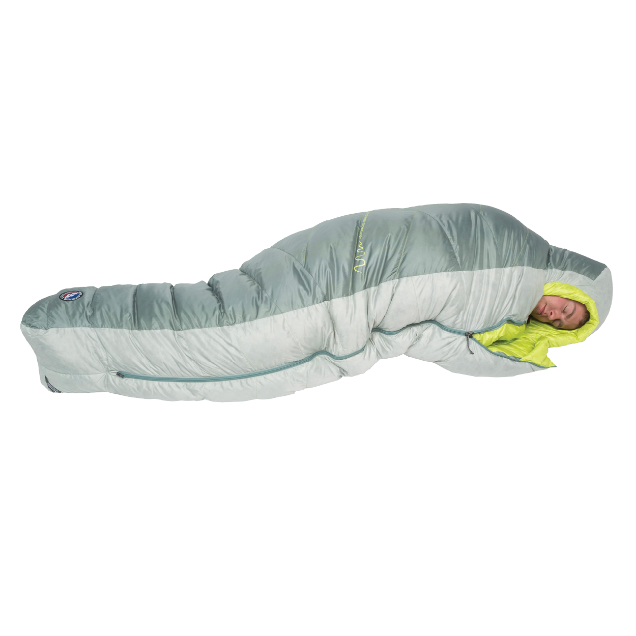 A person is sleeping inside the Big Agnes Sidewinder 0˚, a light gray and lime green mummy-style side sleeper sleeping bag with body-mapped insulation, fully zipped and snug around them, as they rest on a white background.
